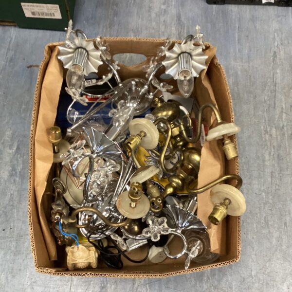 Vintage brass decorative light fittings and chandelier components.