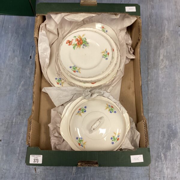 Vintage 1950s china dinner service with floral design.