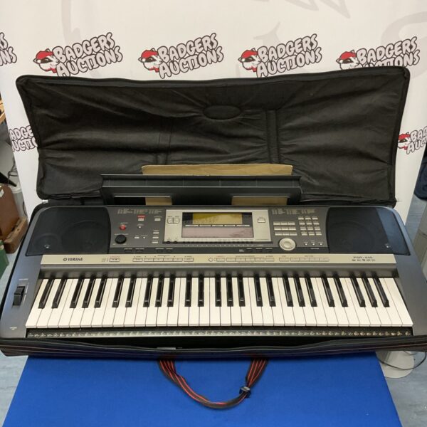 Yamaha PSR-640 keyboard in used condition, showing the keys and controls.