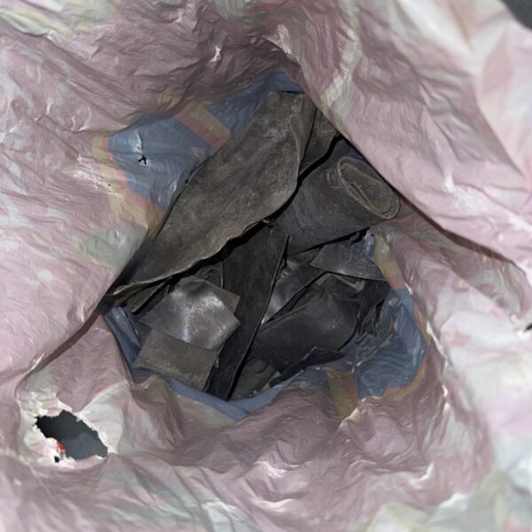 A lot of reclaimed lead flashing for roofing and building projects.