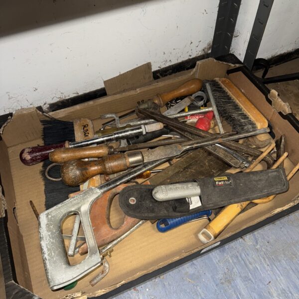 Vintage hand tools lot with screwdrivers and workshop implements.