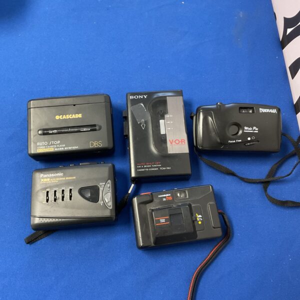 Vintage walkman lot featuring Sony and Panasonic cassette players.