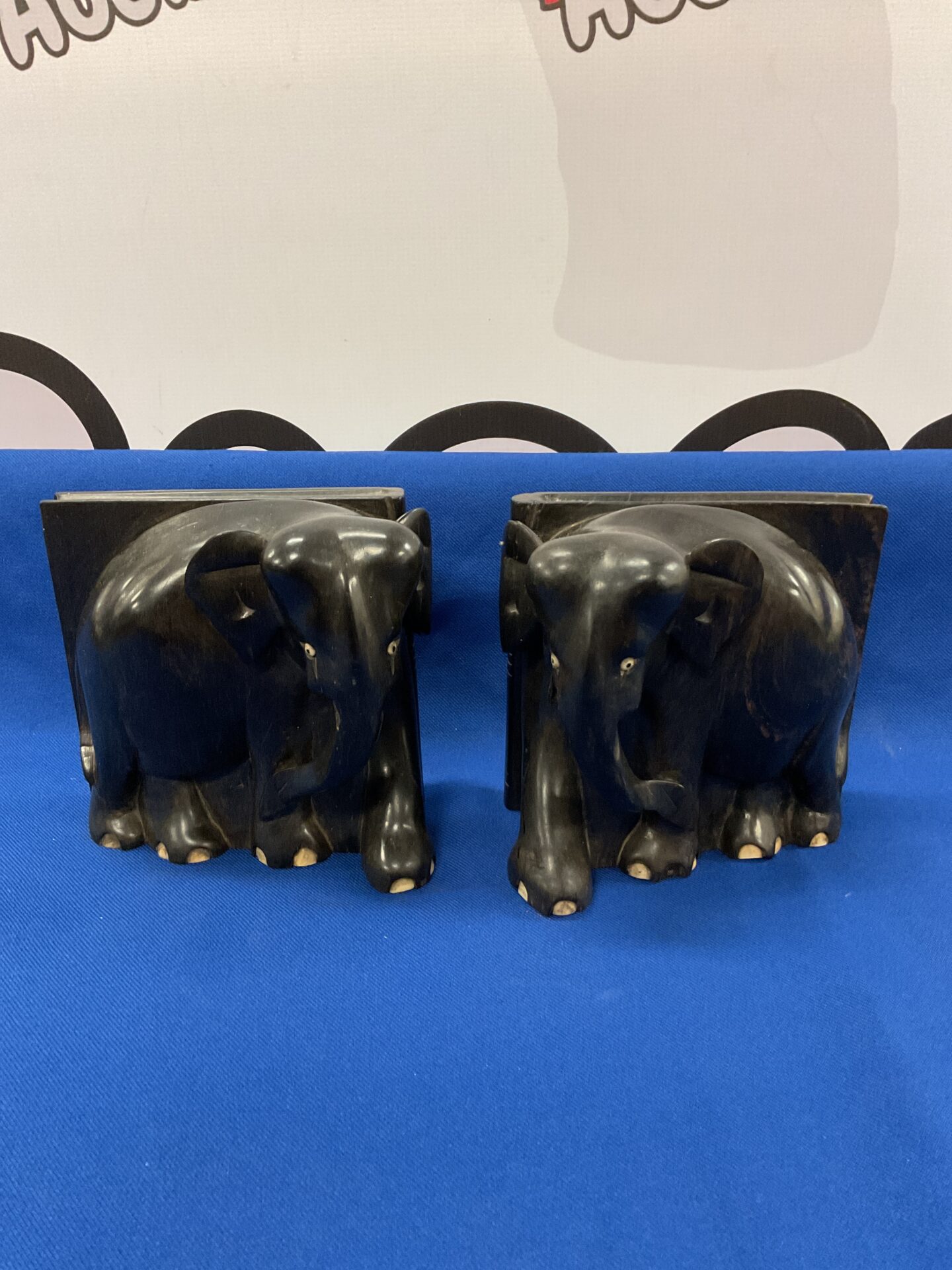 062 Pair of carved ebony elephant bookends