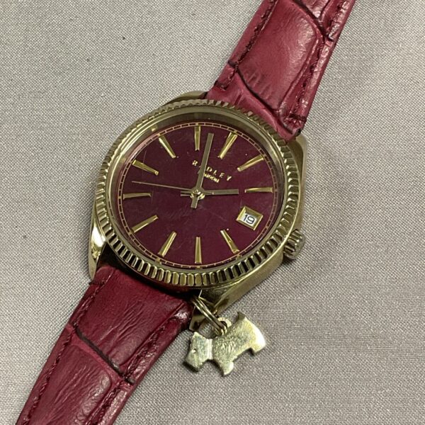 Radley ladies wristwatch with burgundy dial and leather strap.