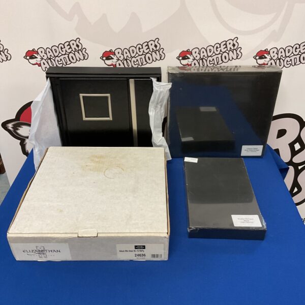 New set of four photo and CD albums for storage and organisation.