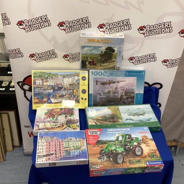 New and sealed Clementoni jigsaw puzzles and model kit lot.