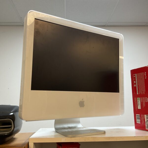 Vintage Apple iMac G3 Bondi Blue retro computer on display.