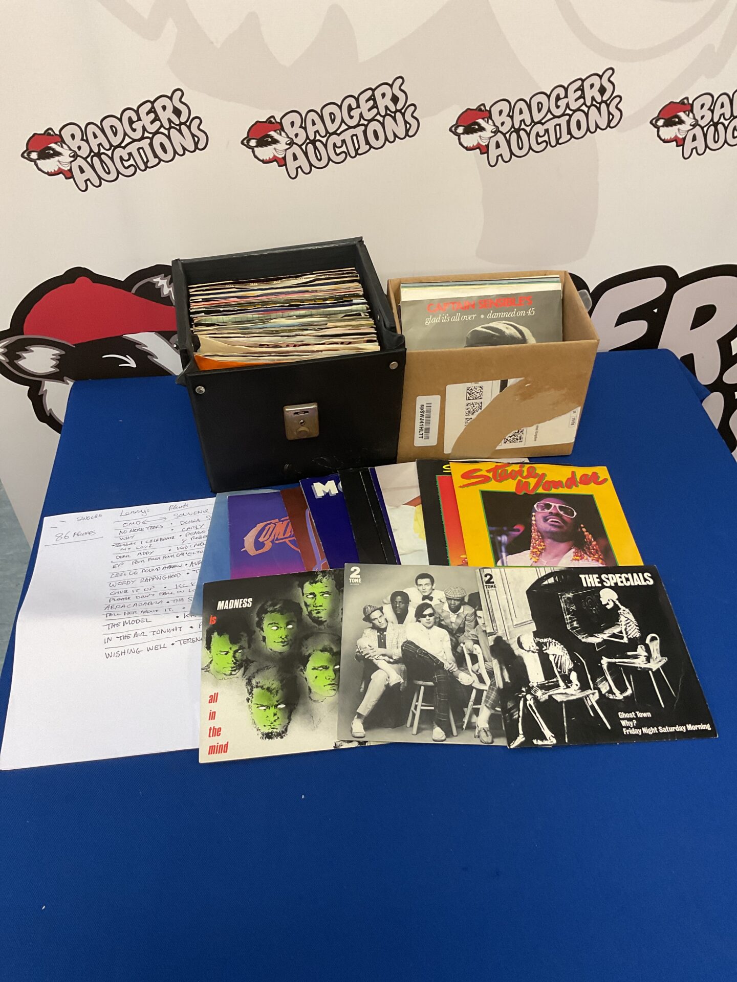244 Collection of 7” single vinyl records including the specials & madness
