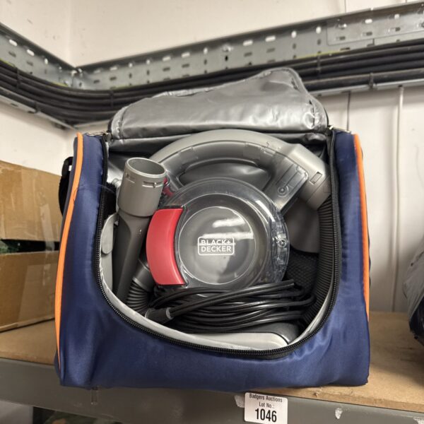 Black & Decker 12V car hoover in a blue carry case.