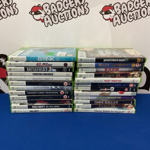 Xbox 360 games lot featuring Brink, Fable II, and Grand Theft Auto.