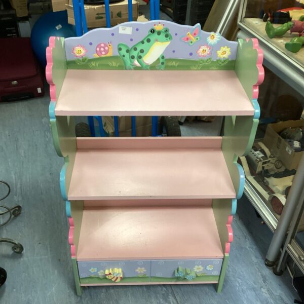 Vintage painted nursery bookcase with floral details.