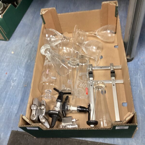 Mixed lot of bar optics and pint glasses for serving drinks.