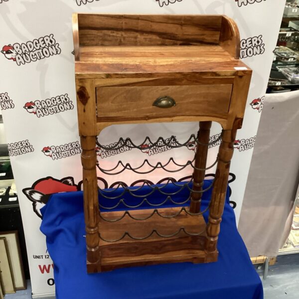 Vintage medium oak wine table with built-in wine rack.