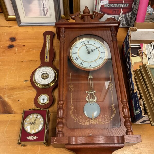 Vintage collection of an Acctim Westminster clock, Bentima carriage clock, and Staiger barometer.