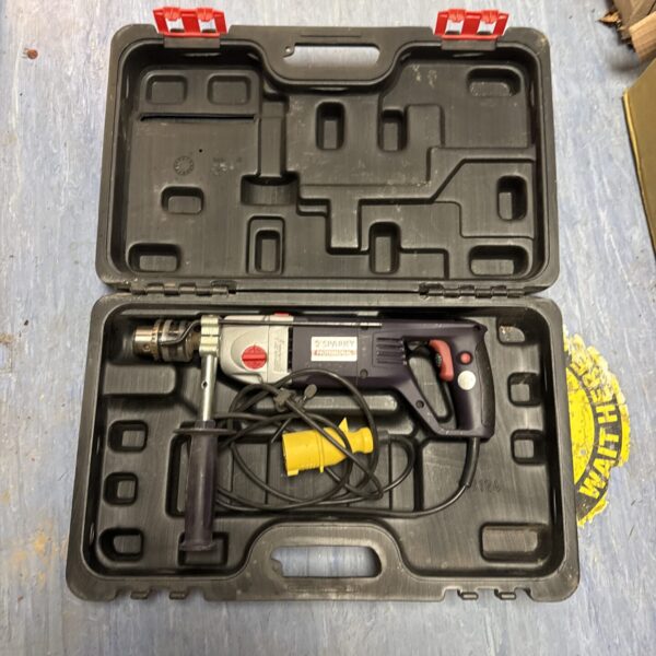 Vintage Sparky 110v drill in its original carrying case.