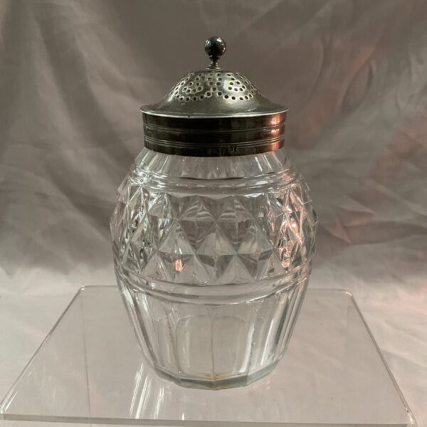 Antique Georgian silver sifter jar with diamond-cut glass.