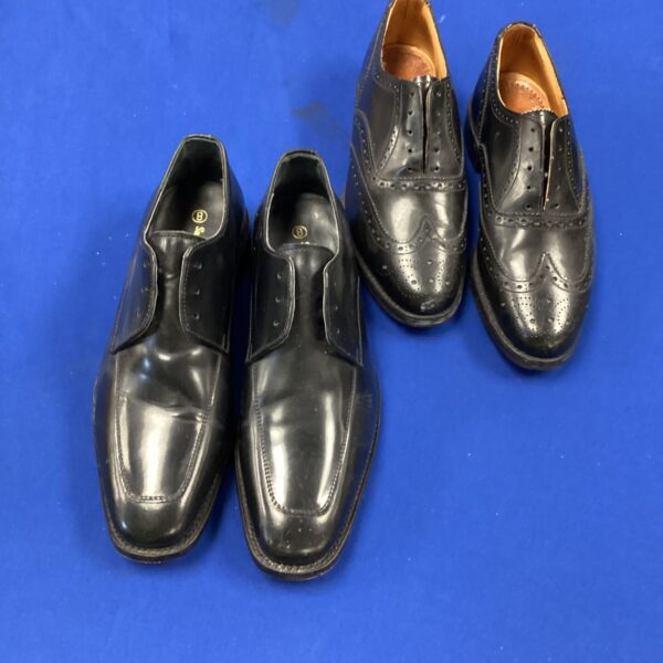 Pair of classic men's leather shoes size 8 with brogue detailing.