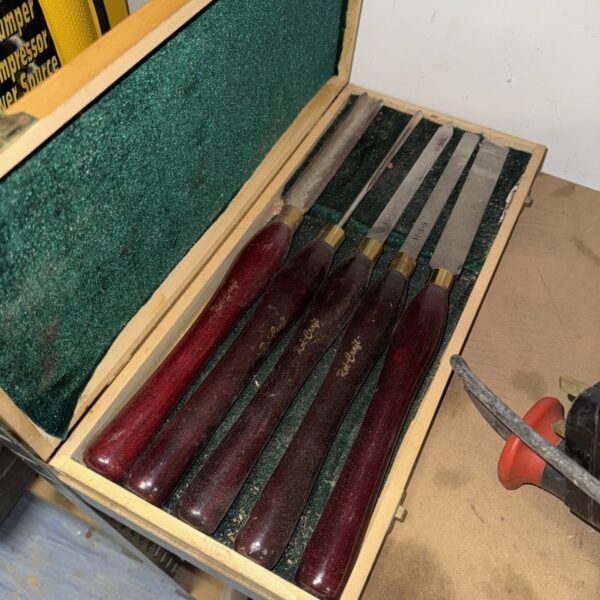 Rolson wood turning chisel set with wooden handles.