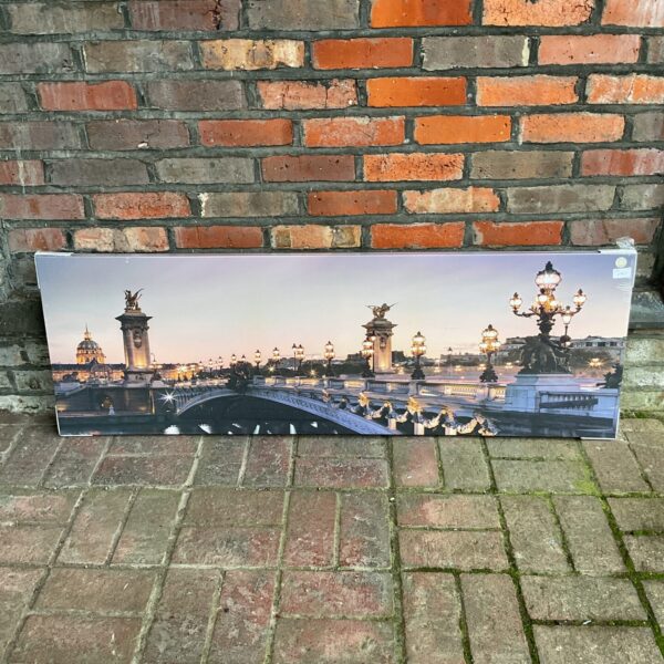 Large canvas print of a continental bridge with ornate lampposts.