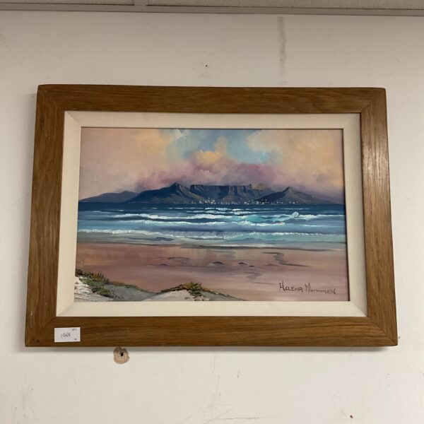 Helena Mummen ocean painting with mountains at dusk.