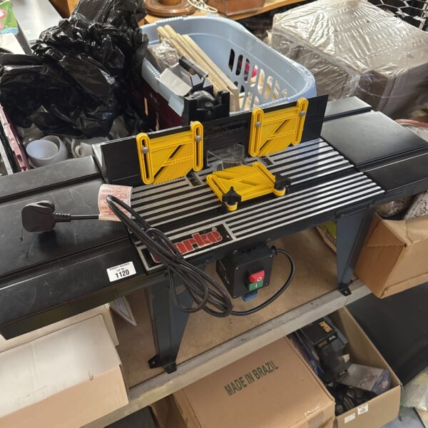 Metal Clarke saw table for woodworking and DIY projects.