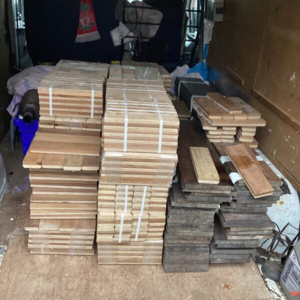 Large lot of reclaimed parquet flooring blocks for restoration.