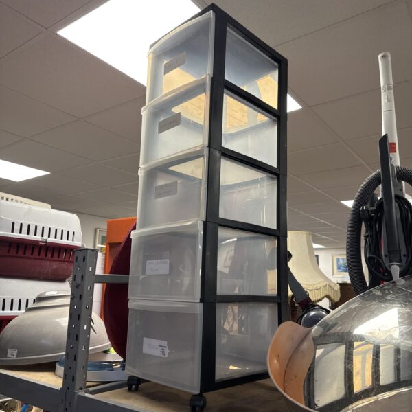 Five-drawer plastic storage unit with wheels for easy organization.