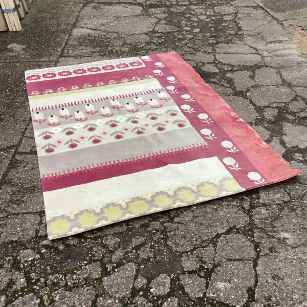 Vibrant floral patterned John Lewis rug for living room.