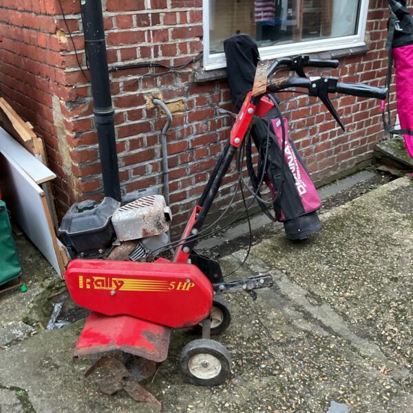 Bally 5hp tiller with Briggs & Stratton engine for garden cultivation.