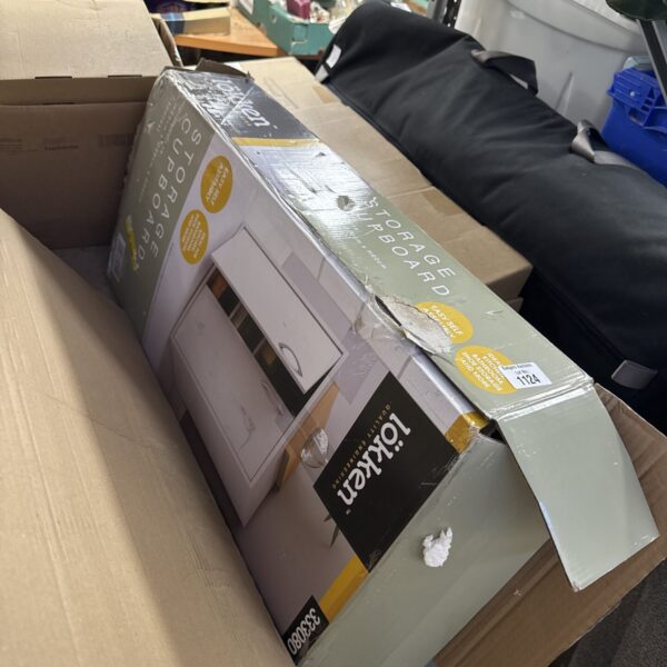 Front view of Lokken storage cupboard in original packaging.