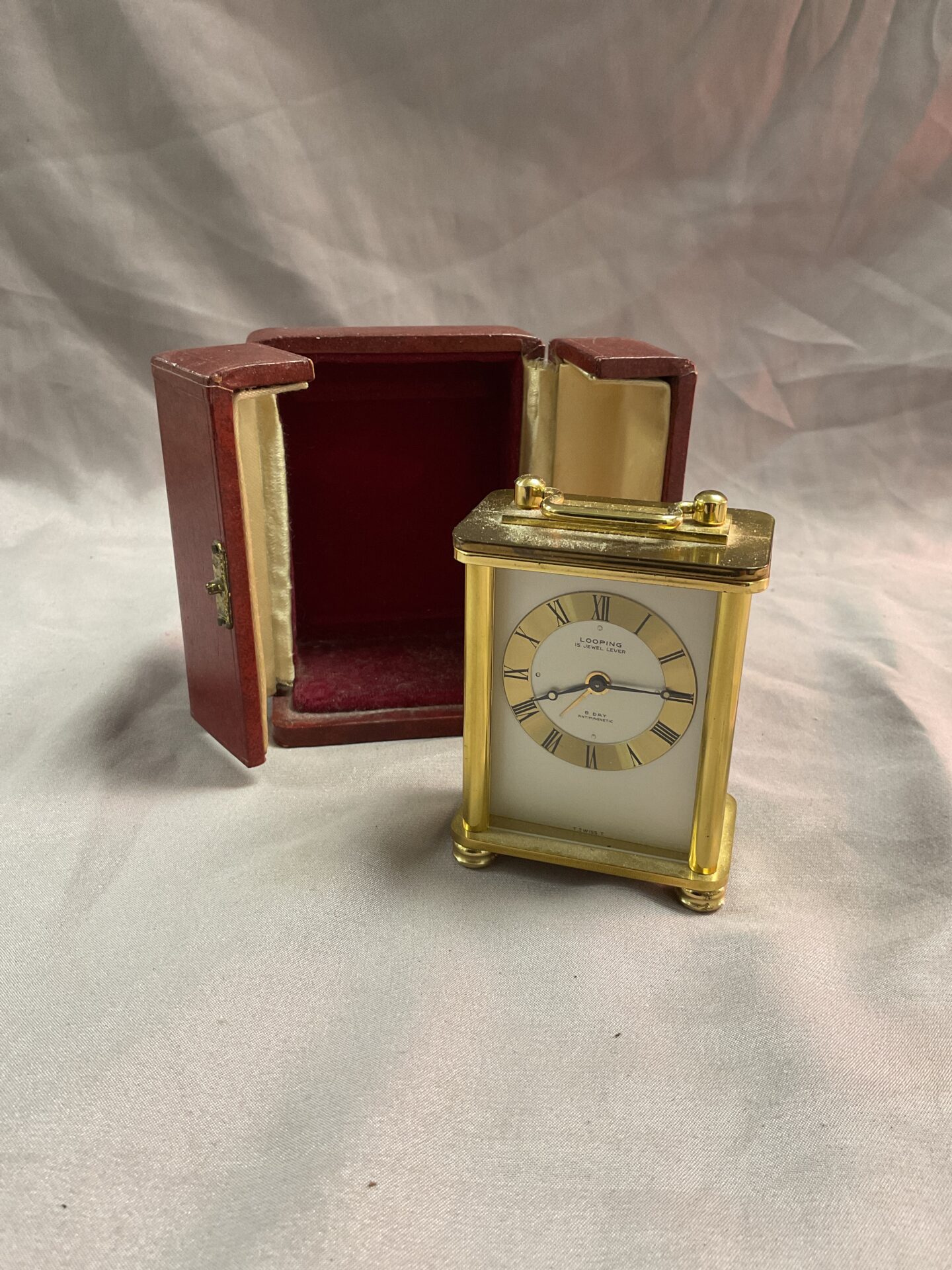 1011 looping brass 3” miniature carriage clock In original travel case