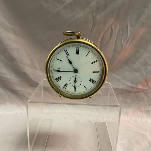 Antique 1910 brass desk clock by J and F with enamel dial.