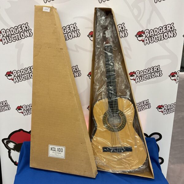 Vintage KCL child acoustic guitar in light wood finish.