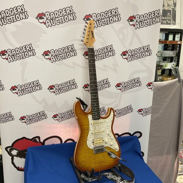 Sunburst finish Storm electric guitar, vintage musical instrument.