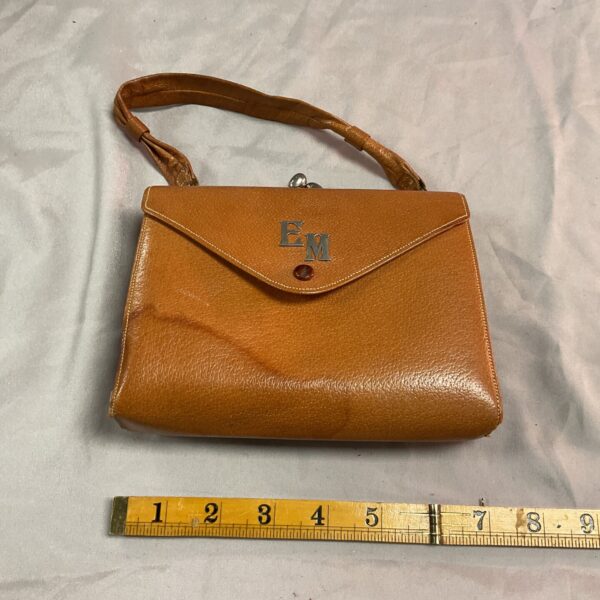 Vintage EM ostrich skin purse with notepad, classic mid-century style.