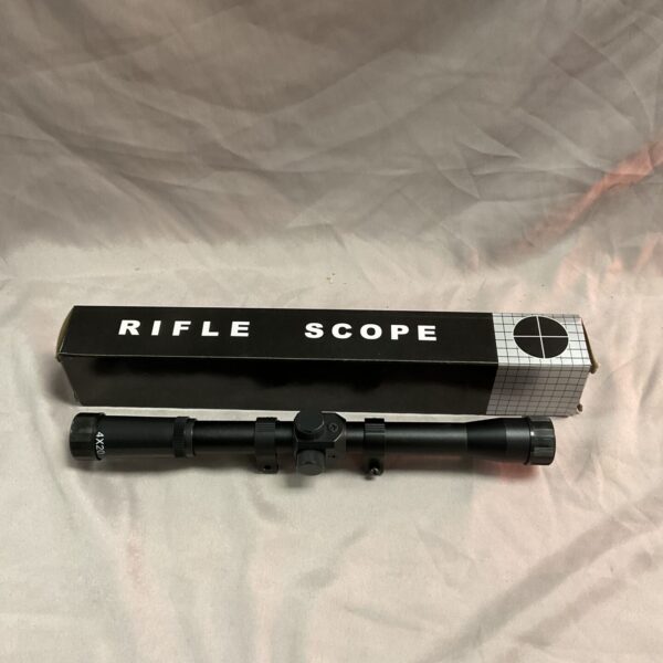 Vintage 4x20 rifle scope with crosshair reticle for hunting.