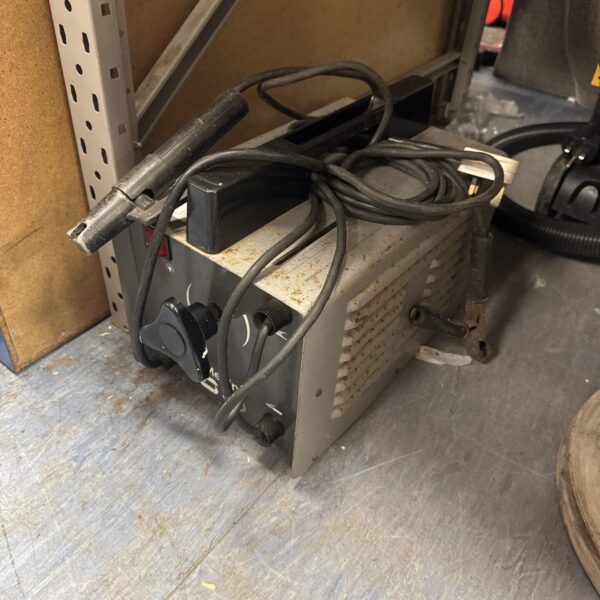 Vintage Sip Merlin portable welder with handle and controls.
