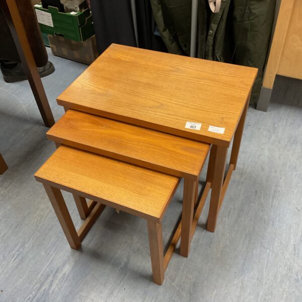Vintage oak nesting tables, classic mid-century modern style.