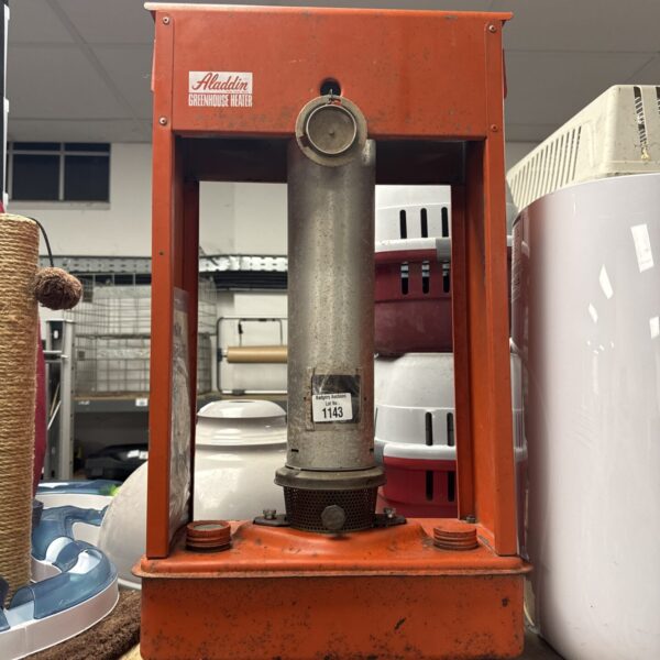 Vintage Aladdin greenhouse heater, a classic paraffin appliance.