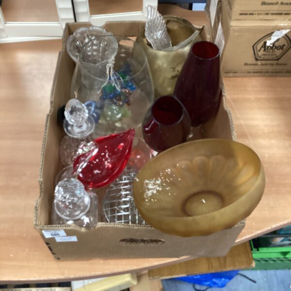 Mixed glassware lot with a cherry glass vase and assorted pieces.