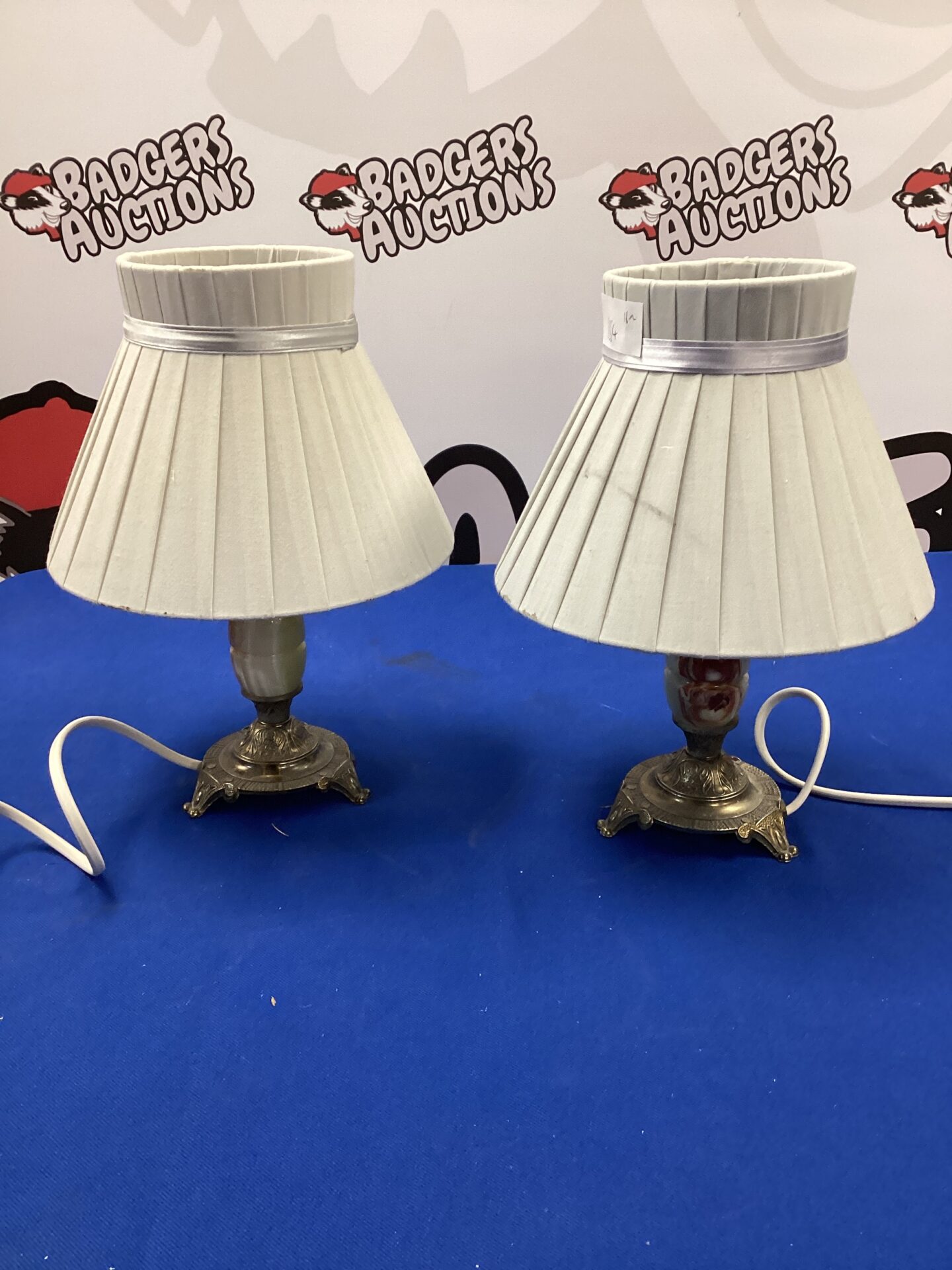 676 Two marble table lamps