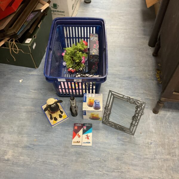 Mixed lot of collectibles including toys and a mirror.