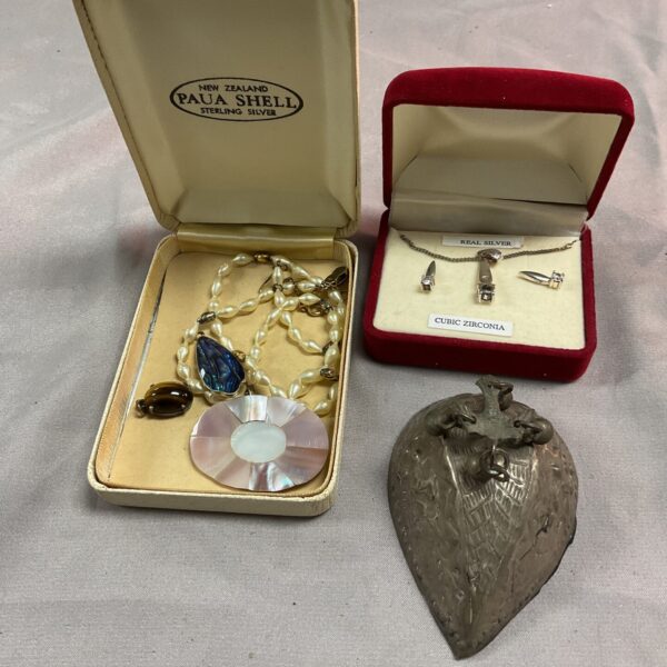 Vintage silver jewellery lot with Egyptian silver and lava rock pendant.