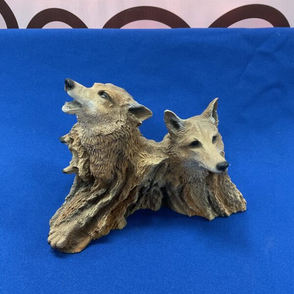 Detailed hand made wolf ornament sculpture for home decor.