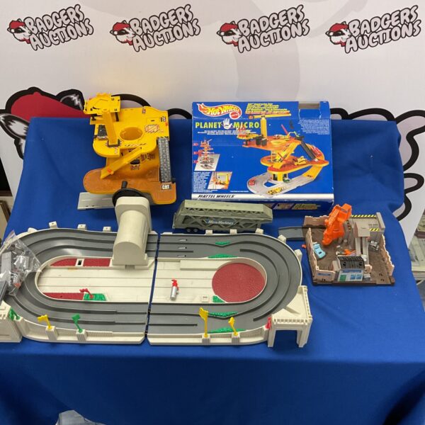 Vintage Hot Wheels Planet Micro Machines playset for collectors.