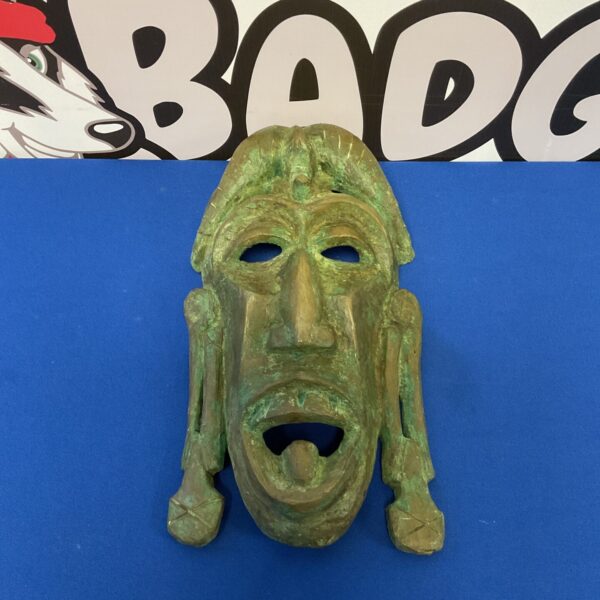 Vintage J James 1970 resin wall mask with tribal features.