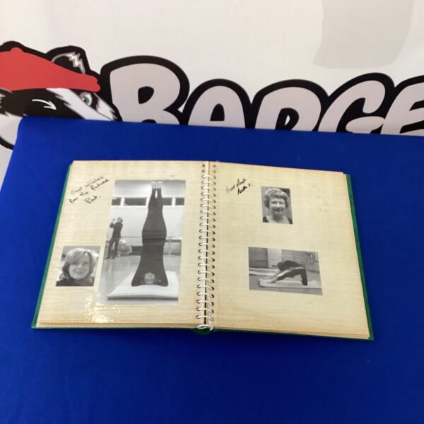 Vintage photo album cover with black and white photography.