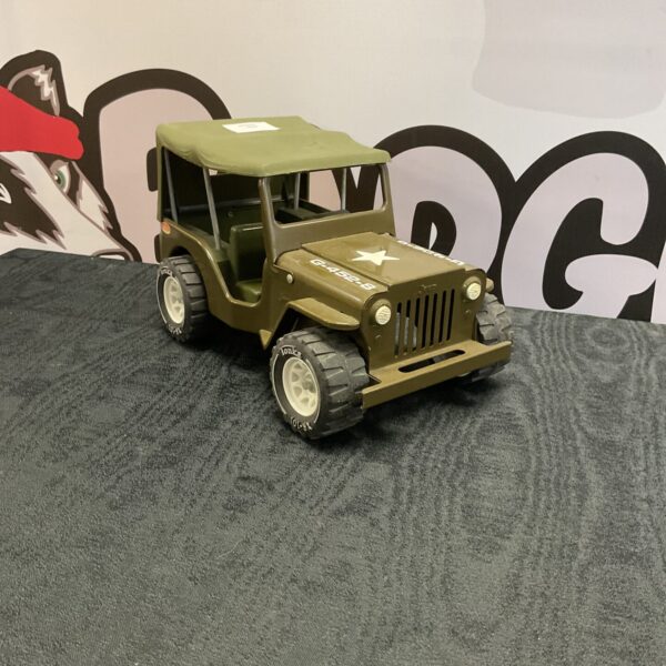 Vintage Tonka military jeep, model G-452-8, green metal toy.