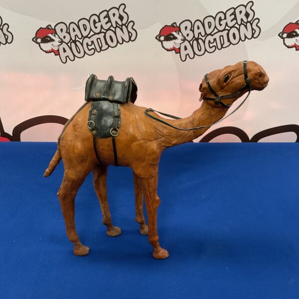 Vintage mid-century leather camel sculpture with saddle.