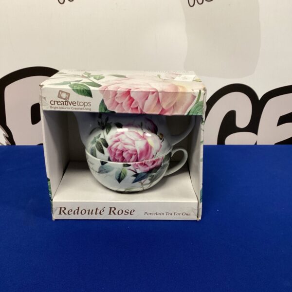 Vintage Redoute Rose tea set with delicate floral design.